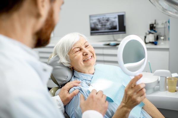 Elderly woman enjoying her new smile